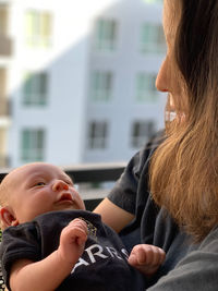 Portrait of mother and daughter outdoors