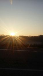 Scenic view of landscape at sunset