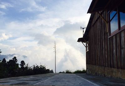 View of road against cloudy sky