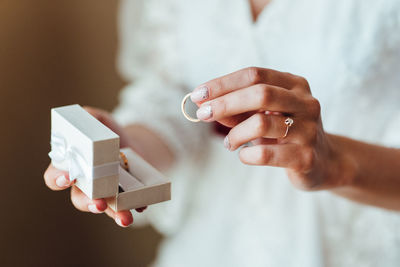 Close-up of woman holding hands