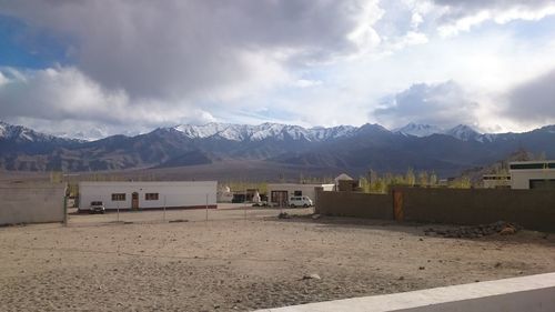 Scenic view of snowcapped mountains against sky