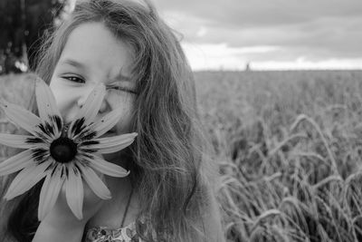 Portrait of girl on field