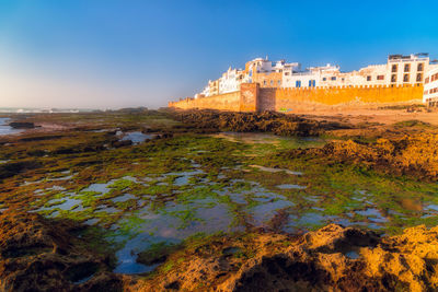 Essaouira skyline with rocks in the foreground