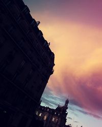 Low angle view of cityscape against sky