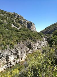 Scenic view of mountains against clear sky