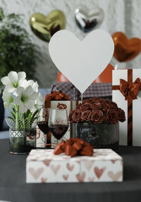 Directly above shot of heart shape on white table