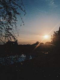 Scenic view of silhouette landscape against sky during sunset