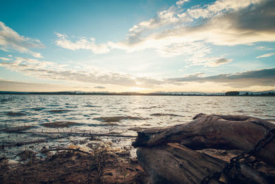 Scenic view of sea against sky during sunset