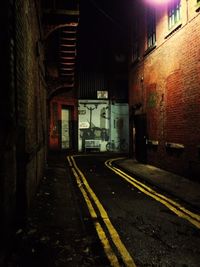 Empty walkway at night