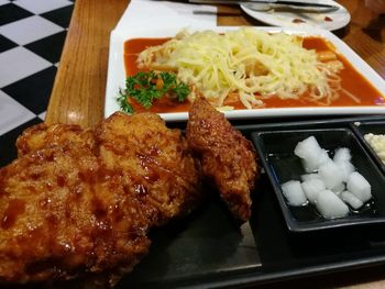 Close-up of served food in plate