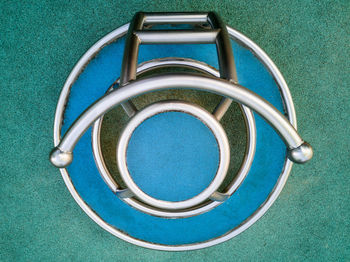 High angle view of blue container on table