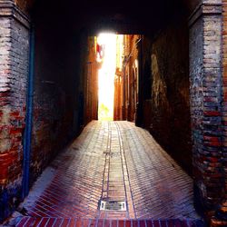 Narrow alley along buildings