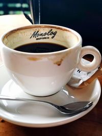 Close-up of coffee cup on table