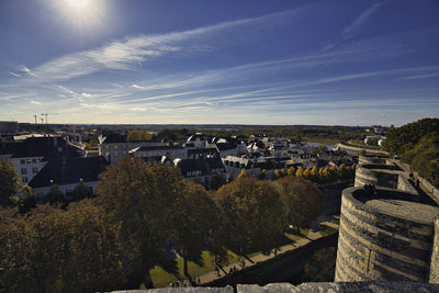 High angle view of buildings in city against sky