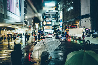 People on street at night