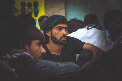 Portrait of young man looking away