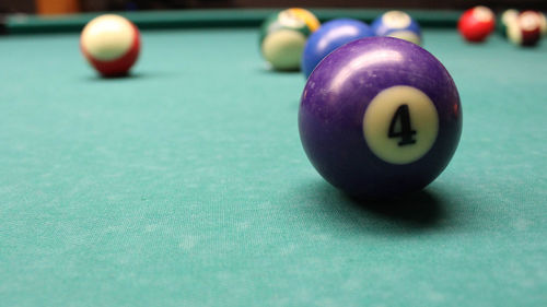 Number 4 ball on pool table