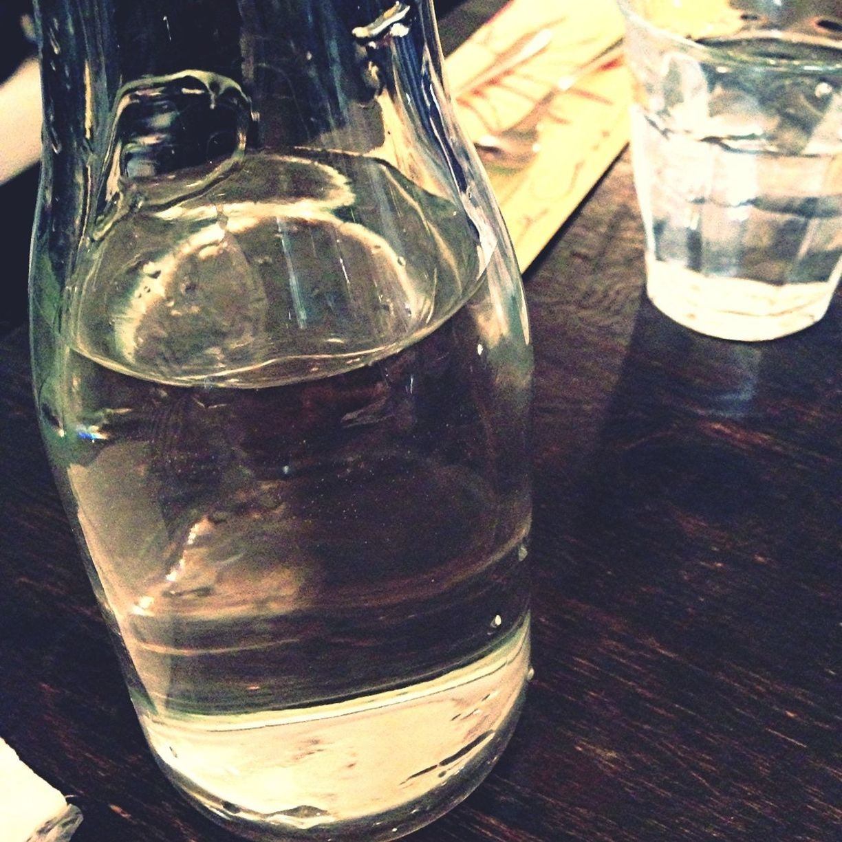 drinking glass, indoors, glass - material, table, drink, food and drink, still life, transparent, refreshment, close-up, glass, alcohol, freshness, wineglass, jar, bottle, focus on foreground, no people, water, ice