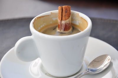 Close-up of coffee cup on table