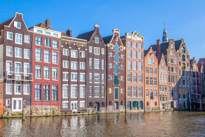 View of buildings against blue sky