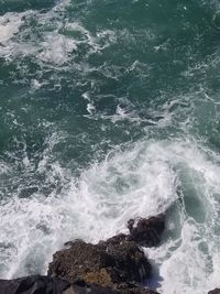 High angle view of waves in sea