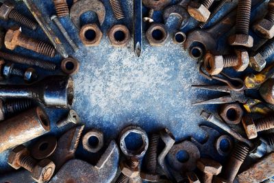 Directly above shot of rusty tools on table