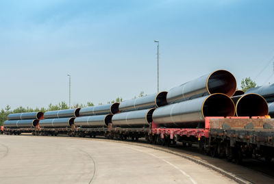 Train on railroad track against sky