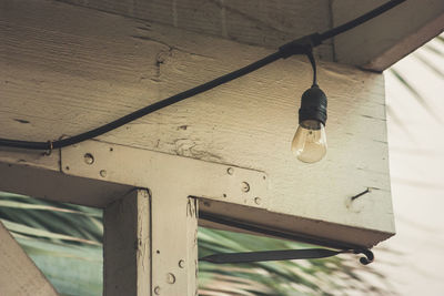 Low angle view of illuminated light bulb