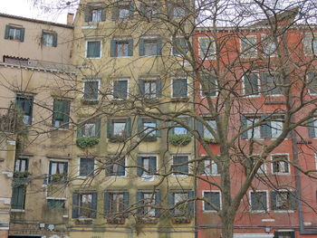 Low angle view of residential building against sky