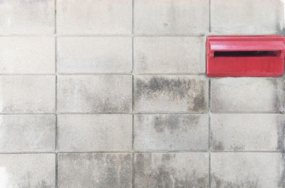 Close-up of mailbox on wall