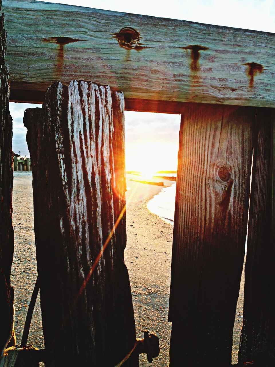 wood - material, wooden, weathered, sea, wood, built structure, beach, old, damaged, abandoned, close-up, outdoors, rusty, day, architecture, sunlight, protection, fence, wooden post, no people