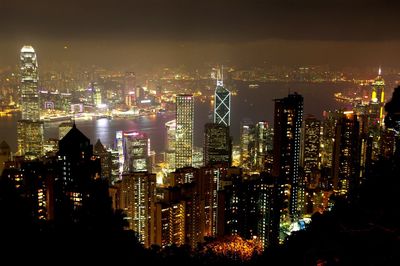 High angle view of cityscape illuminated at night