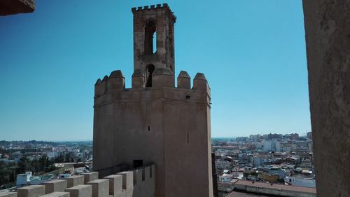 View of old building against blue sky