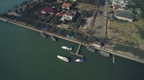 High angle view of river amidst buildings in city