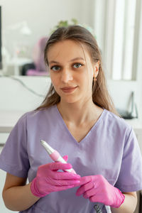 Young woman using mobile phone