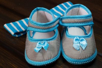 Close-up of shoes on table