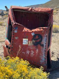 Close-up of yellow abandoned on field