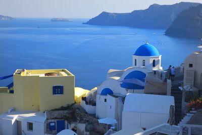 High angle view of townscape by sea