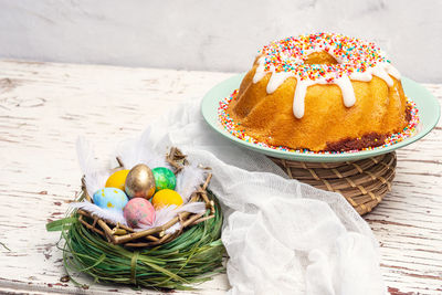 Various fruits in basket on table