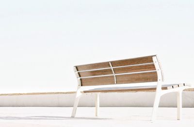 Empty chair against white background