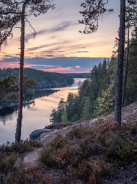 Scenic view of lake against sky during sunset