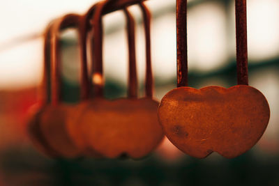 Close up of the copper lock of the love heart type