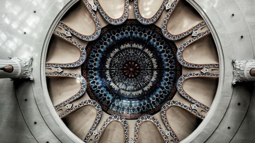 Directly below shot of ornate ceiling