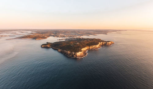 High angle view of sea during sunset