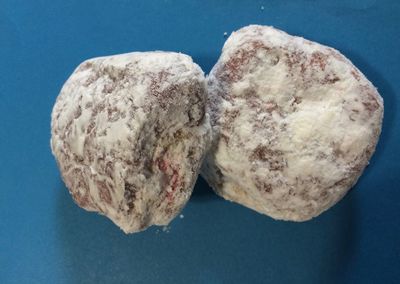 High angle view of bread on table against blue background