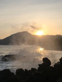 Scenic view of sea against sky during sunset