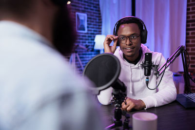 Men podcasting at studio