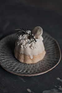 Close-up of ice cream cone on table