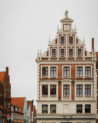 Low angle view of old buildings with beautiful architecture against sky