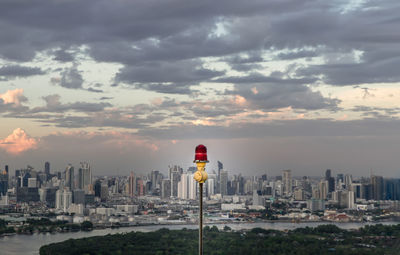 Cityscape against sky during sunset